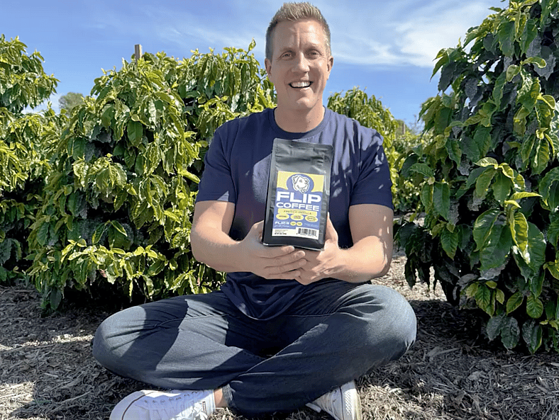 Rocky holding Flip Coffee French Vanilla